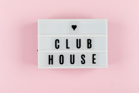 Flat lay of lightbox with text Clubhouse. Social application on the smartphone. New trendのeditorial素材