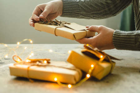 Christmas and New Year card. Number 2022 on holiday background. Christmas lights bokeh background