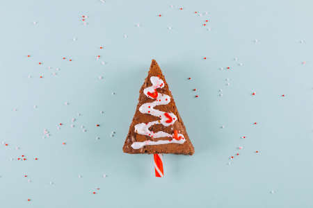 Christmas sweet tree made from chocolate brownie. Christmas fun food. Cute idea for kids for christmas dessert. Top view, crop square imageの写真素材