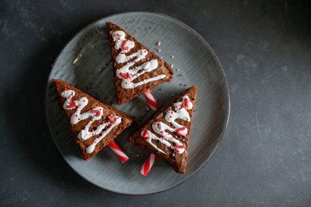 Christmas sweet tree made from chocolate brownie. Christmas fun food. Cute idea for kids for christmas dessert. Top view, crop square imageの写真素材