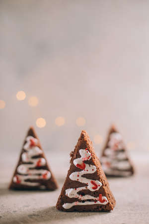 Christmas sweet tree made from chocolate brownie. Christmas fun food. Cute idea for kids for christmas dessert. Top view, crop square imageの写真素材