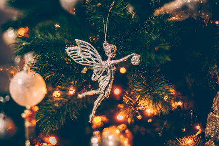 Decorated Christmas tree with silver ornaments. Merry Christmas and happy new year concept.