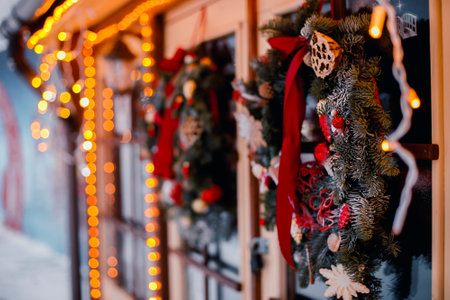 Red and sivlver decoration on Christmas tree at home interior. Holiday background with bokeh lights. copy spaceの写真素材