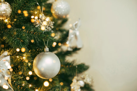 Decorated Christmas tree with silver ornaments. Merry Christmas and happy new year concept.の写真素材