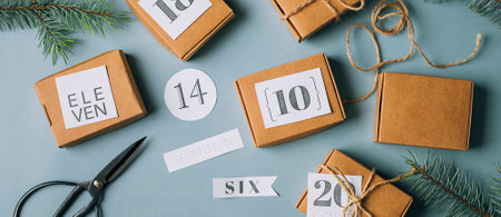 Flat lay on Christmas advent calendar. Eco Craft boxex gifts. top view.の写真素材