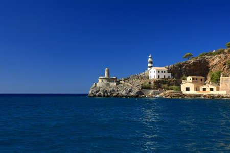 Port of Soller Lighthouse with amazing coastline in Majorca island, Spainの写真素材