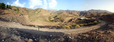 A beautiful mountain scape panorama with empty road in Gran Canaria, Spainの写真素材