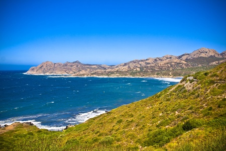 Crystal clean sea along beuty green coastline in amazing island Corsicaの写真素材