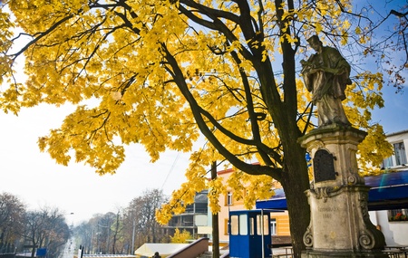 St  John of Nepomuk in Czestochowa city under the autumn leaves, Poland