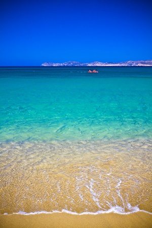 Sea bay with moored boats, promenade in Mediterranean town Sitia Greece Creteの写真素材