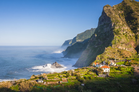 View of beautiful mountains and ocean on northern coast near Boaventura, Madeira island, Portugalの写真素材