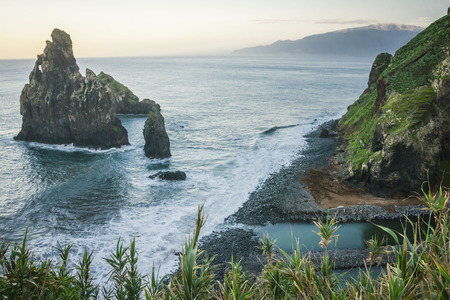 View of beautiful mountains and ocean on northern coast near Boaventura, Madeira island, Portugal