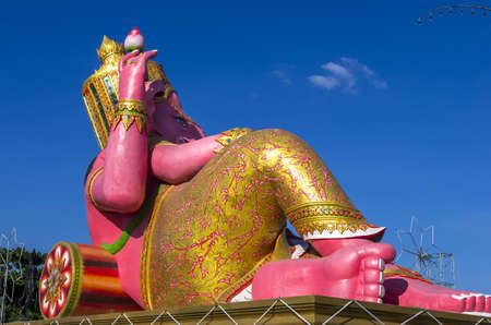 Giant statue of diety Ganesh shown in a relaxed poseの写真素材