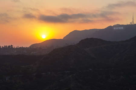Los Angeles, California - June 9th, 2013 : This is the view at sunset of the Hollywood sign in the distance from the north side of Griffith Observatory located on Mount Hollywoodのeditorial素材