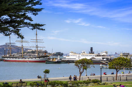 San Francisco, California - June 12, 2013 : Various historical ships docked at Hyde Street Pier, San Francisco Maritime National Historic Parkのeditorial素材
