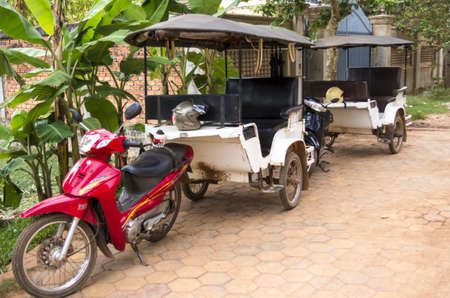 Siem Reap, Cambodia - April 14, 2013   The Tuk Tuk, a cheap popular mode of transport in Siem Reap,...