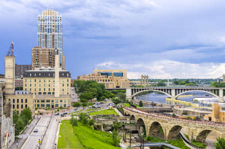 Minneapolis, Minnesota - June 17, 2013   The Stone Arch Bridge is a former railroad bridge crossing the Mississippi River at Saint Anthony Falls in downtown Minneapolis, Minnesota  The structure is now used as a pedestrian and bicycle bridge  It is an Hisのeditorial素材