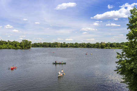People rowing on the Lake of the Isles in Minneapolis, Minnesota のeditorial素材
