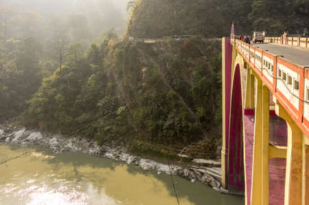 Siliguri, Darjeeling province - January 9, 2014   The Coronation Bridge, spans across the Teesta River, connecting the districts of Darjeeling and Jalpaiguri  National Highway 31 runs across it  It is situated close to Siliguri town of India のeditorial素材