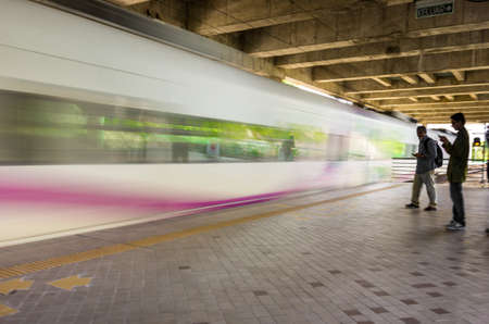 Putrajaya, Malaysia - 15 June 2014   A train zips past a small station in Putrajaya, Malaysiaのeditorial素材