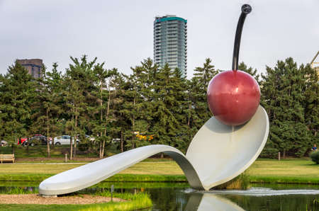 Minneapolis, Minnesota - August 20, 2014:  The spoonbridge and cherry sculpture by Claes Oldenburg, Coosje van Bruggen at the Minneapolis Sculpture Garden in Minneapolis , Minnesotaのeditorial素材