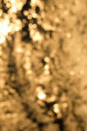 Bokeh effect on a seawater surface with wavesの写真素材