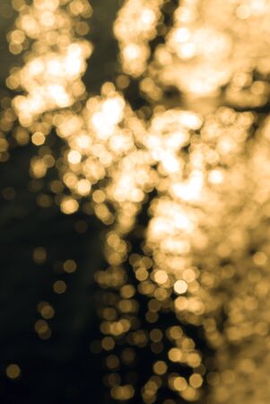 Bokeh effect on a seawater surface with wavesの写真素材