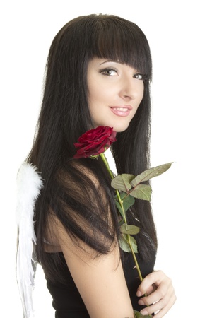 Beautiful angel woman with roseの写真素材