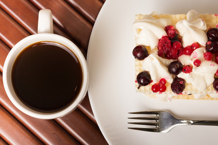 Berries and ice cream desert with coffeeの写真素材