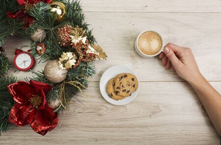 Coffee and a chocolate chips with Christmas decor