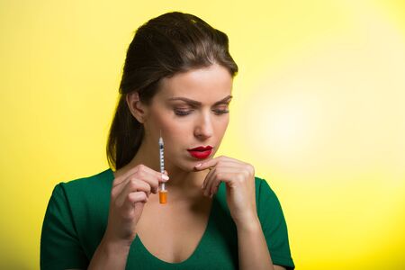 Woman with a skin treatment injectionの写真素材