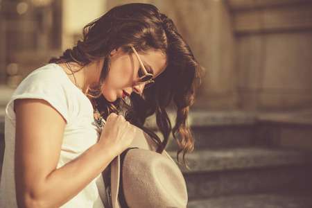 Stylish boho girl in summer cityの写真素材