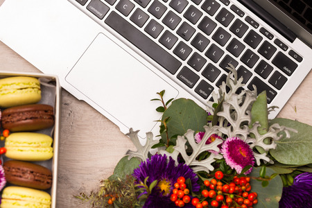 Seasonal autumn wreath with flowers and berriesの写真素材