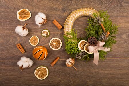 Christmas wreath and decor on a wooden backgroundの写真素材