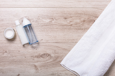 Various cosmetics arranged on a wooden backgroundの写真素材