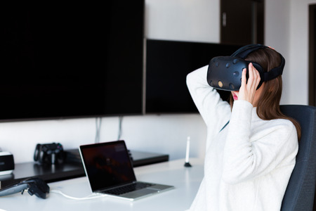 Woman working at the laptop in the officeの写真素材