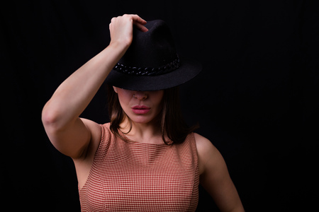 Beautiful woman wearing a wool hat. Retro style imageの写真素材