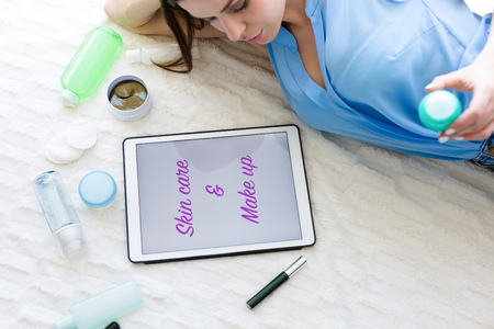 Woman choosing a skincare products. Hight angle view