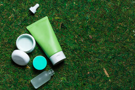 Cosmetics on a spring background high angle viewの写真素材