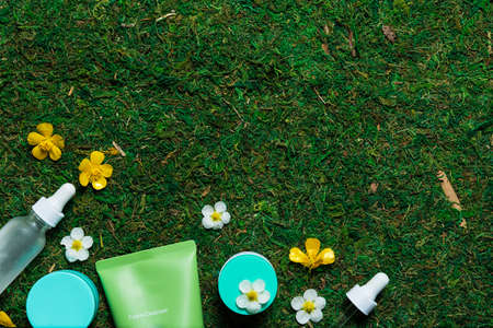 Cosmetics on a spring background high angle viewの写真素材