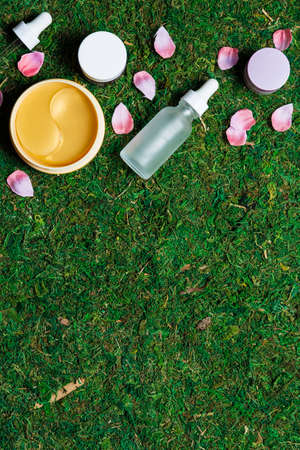 Cosmetics on a spring background high angle viewの写真素材