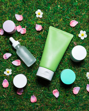 Cosmetics on a spring background high angle viewの写真素材
