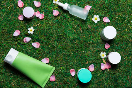 Cosmetics on a spring background high angle viewの写真素材