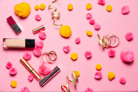 Makeup set on a vibrant holiday  backgroundの写真素材