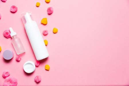 Cosmetics set on a bright background. High angle viewの写真素材