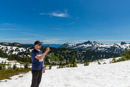 Beautiful panorama of Cascade range with volcanos as seen from Mt. Rainierの写真素材