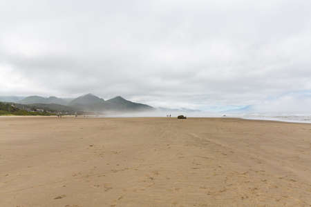Beautiful misty ocean shore at Cannon Beach, Oregon in the summer of 2020の写真素材