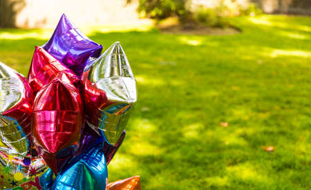 Birthday party colorful balloons at the backyard