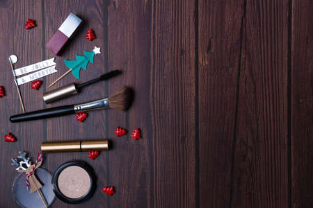 Christmas background with wooden table and decor flat layの写真素材