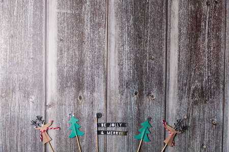 Christmas background with wooden table and decor flat layの写真素材